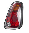 A taillight of a stop signal for a German auto - optical equipment of white and red color on a white isolated background. A spare part for repair and sale in a car service center.