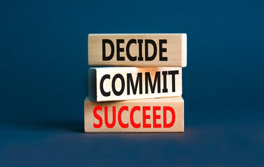 Wall Mural - Decide commit succeed symbol. Concept word Decide Commit Succeed on beautiful wooden block. Beautiful grey table grey background. Business decide commit succeed concept. Copy space.