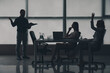 © Pixel-Shot - Silhouette of business consultants working in office