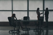 © Pixel-Shot - Silhouette of business consultants working in office