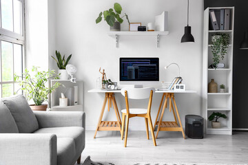 Canvas Print - Interior of office with programmer's workplace and sofa