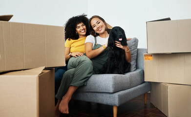 Sticker - Real estate, portrait and lesbian couple with a dog on the sofa for moving boxes and a new home. Smile, lgbt and women or people on the living room couch of an apartment with a pet after relocation