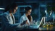 © somchai20162516 - Two female scientists are using laptops in the laboratory.