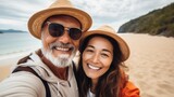 Fototapeta Do akwarium - Happy couple traveling together, Enjoying summer at sea and taking selfies.