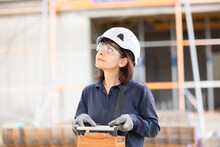 Technician Female Controls With Device Construction Crane