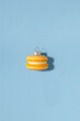 © Cavan Images - Christmas macaroon bauble. Creative new year's concept