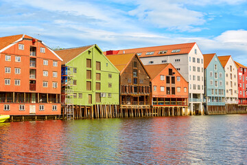 Wall Mural - Colorful old timber houses over the Nidelva river in Trondheim, Norway