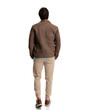 © Viorel Sima - back view of young casual guy in brown jacket holding hands in pocket