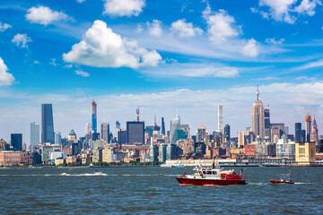 Wall Mural - Fire Department boat against Manhattan