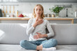 © brizmaker - Woman doing calming breathing exercises after panic attack