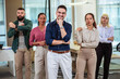 © Mediteraneo - Portrait of a successful group of business people at modern office looking at camera. 