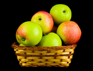 Wall Mural - Apples isolated on a black background.