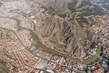 Wall Mural - Amasya,TURKEY old riverside Turkish(ottoman) city buildings and its reflection on water,sunny summer day.Amasya is city of princes of ottoman. ottoman Princes were educated in Amasya