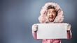 © MQ-Illustrations - Smiling Asian man wearing pink coat, holding sign, surprised. Warm Winter clothes.
