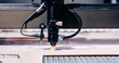 Laser CNC cutting wood. Modern machine industrial technology
