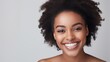 Smile of black woman with perfect white teeth. 