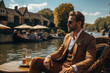 photo of the guy by a picturesque riverside location, dressed in vintage fashion, epitomizing the old money lifestyle of leisure and luxury by the water