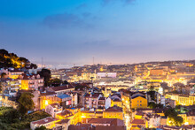 Portugal,Lisbon District, Lisbon, Long Exposure Of Illuminated City At Dusk