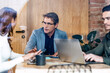 © Westend61 - Business people having discussion and meeting in office