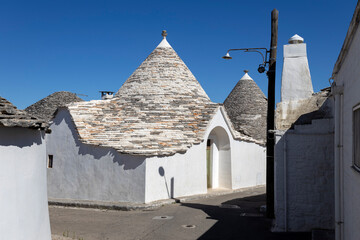 Wall Mural - The Trulli of Alberobello, the typical limestone houses in the province of Bari, Puglia, Italy