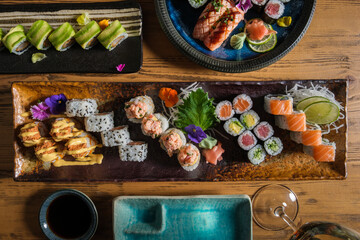 Wall Mural - Traditional sushi rolls on table