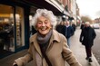Portrait of a happy senior woman on the streets of London.
