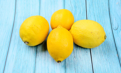 Sticker - Group of fresh lemons on a wood table