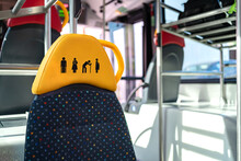Seat reserved for people with disabilities in an adapted bus.