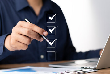 Digital Checklists for efficient business management, Businessman touching marking on checklist guide to paperless assessment and Future Success, Streamlining operations with online surveys.