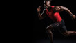 © Keitma - A strong athletic, man sprinter, running on black background wearing in the sportswear, fitness and sport motivation concept