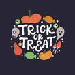 Trick or treat hand written lettering quote with pumpkins, candies, ghost