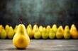 one pear standing alone in a bunch of pears, a group of yellow pears arranged in a line against a dark background