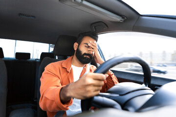 Exhausted Arab Driver Man Stuck In Traffic Jam In Car