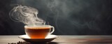 Hot tea with steam in a cup, on a dark background. Generative AI.