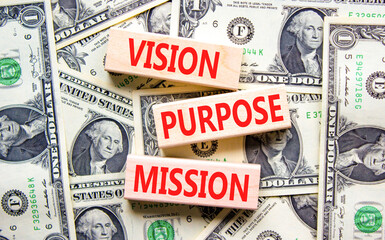 Vision purpose mission symbol. Concept word Vision Purpose Mission on beautiful block. Dollar bills. Beautiful dollar bills background. Business motivational vision purpose mission concept. Copy space