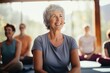 © Geber86 - Diverse group of senior women and friends doing yoga and meditating together in a yoga class