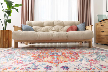 Poster - beautiful rug and sofa near window indoors, low angle view