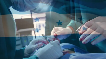 Sticker - Animation of waving honduras flag against team of diverse surgeons performing operation at hospital