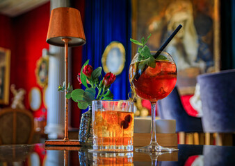 Wall Mural - Cocktails waiting for customers and a colorful luxury interior at a luxury bar in the Carre d’Or, Nice, French Riviera, South of France