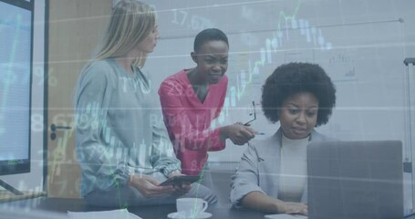 Canvas Print - Animation of stock market data processing over three diverse women discussing over laptop at office