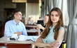 © H_Ko - young beautiful woman have meeting with her subordinates in cafe