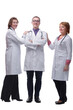 © ASDF - Attractive male doctor standing in front of medical group