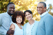© Anela/peopleimages.com - Nature, portrait and people with senior parents in an outdoor park for bonding together. Happy, smile and young man and woman with elderly mom and dad in retirement in green garden for fresh air.