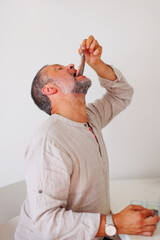 Man eating the dutch soused herring