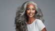 Captivating Middle-Aged Woman with Elegant Grey Hair: A Skin Care Concept Portrait