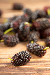 Wall Mural - Ripe fresh blackberry fruits on the table.