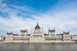 Fototapeta Lawenda - The Best Panorama of Hungarian Government Parliament with blue sky in Budapest, Hungary