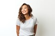 © Leon Waltz - portrait of a Filipino woman in her 30s wearing a fun graphic tee against a white background