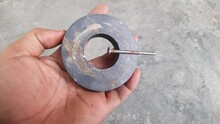 The Circular Speaker Magnet Attracts Metal Objects,