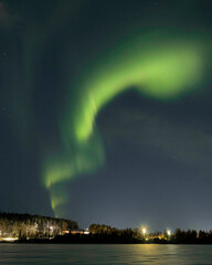 aurora borealis over a frozen lake